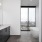 Bath with dual vanity, large mirror and glass enclosed shower