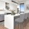Open kitchen and living room with plenty of natural light.