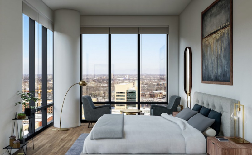 bedroom with long windows and ample room for decor and furniture