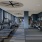 spacious fitness center with area for stretching and/or yoga activities