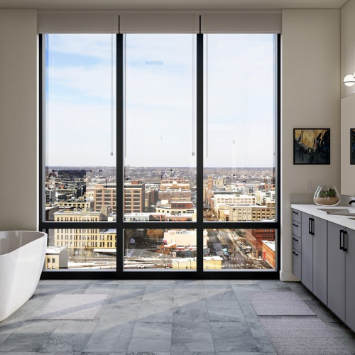 Bespoke Design bright bathroom with wall-to-wall style bathrooms showing views of the near neighborhood