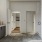 bathroom with bright settings, a standalone tub, and ample space