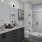 bathroom with bright settings, a walk-in shower and ample space