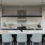 large resident kitchen area with tables and ample seating for dining and lounging