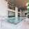 Large pool with shaded seating and clubhouse access.